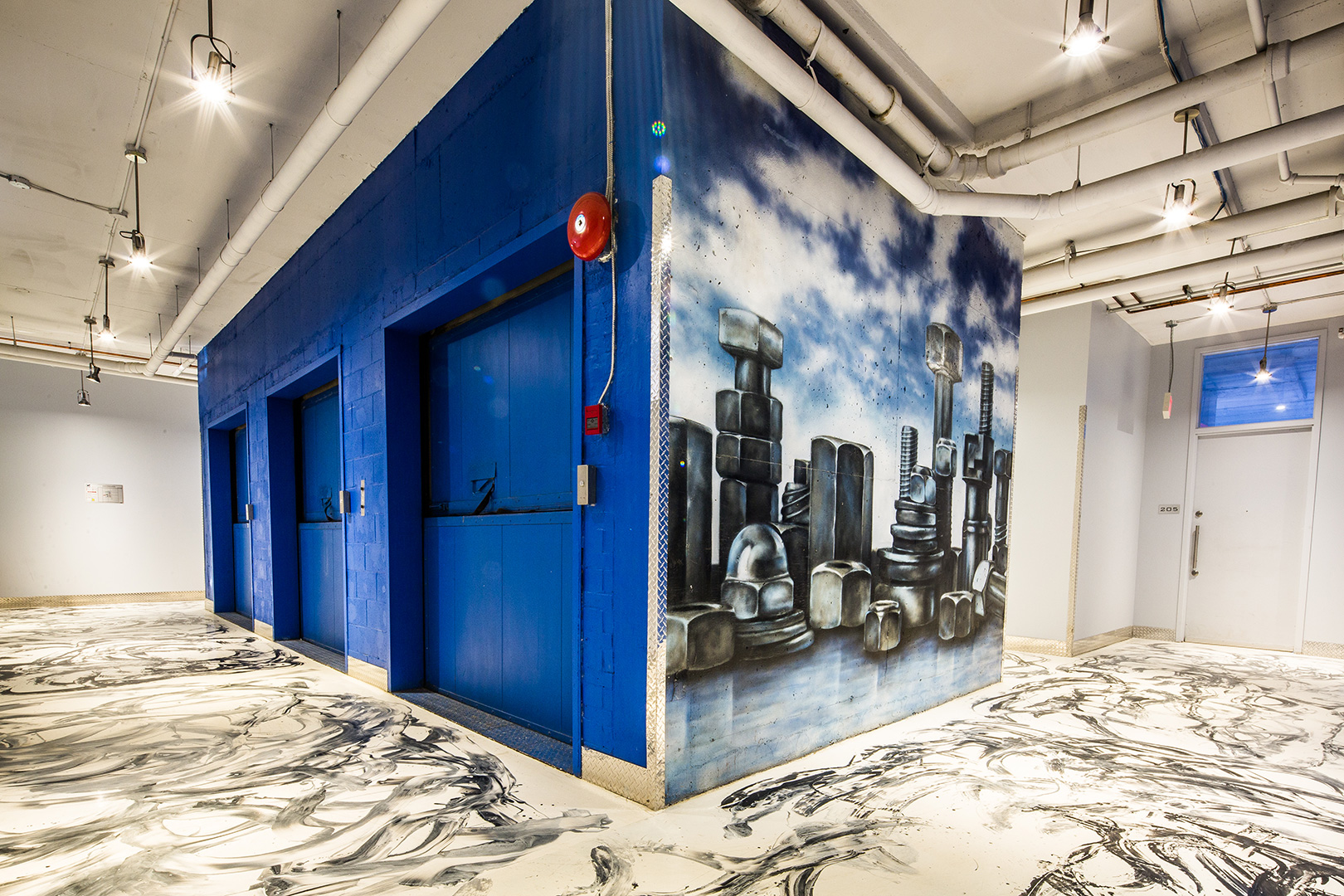 2nd floor of carré de gaspé with mural